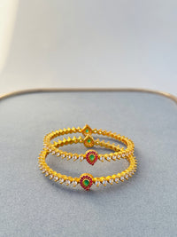 ANTIQUE EMERALD AND RUBY STONE BANGLES